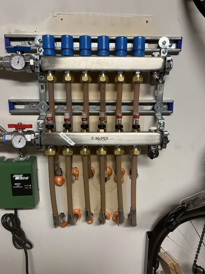 Plumber performing Water Heater Repair at a residential property in Spanish Fork